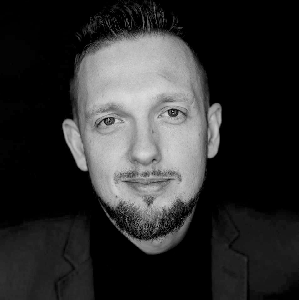 Cinematic portrait of Andre Gromkovski — executive coach, psychotherapist, and Managing Director of UFC Eurasia